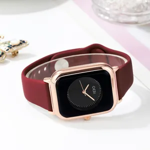 Minimalist square rose gold watch with burgundy silicone strap and black dial by GEDI