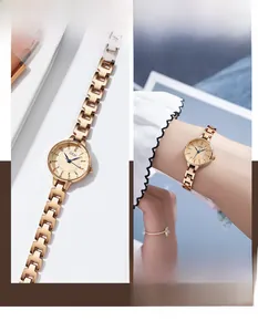 Detail of GEDI rose gold quartz watch with round dial and elegant metal link bracelet