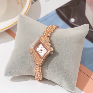 Luxurious rose gold rhombus watch for women with sparkling crystal accents and leaf bracelet