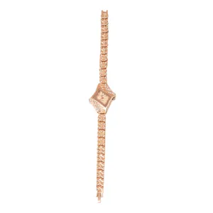 Elegant rose gold women's quartz watch with rhombic diamond case and leaf-shaped bracelet