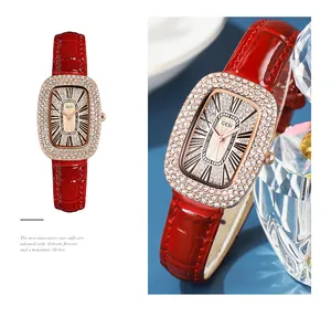 Detailed view of women's quartz watch with red leather strap and crystal bezel