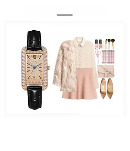 Close-up of a ladies' square rose gold watch with rhinestone dial and black leather strap