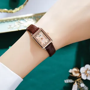 Vintage Damen-Quarzuhr mit römischen Ziffern und braunem Lederarmband
