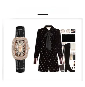 Fashionable tonneau-shaped watch with crystal bezel and black leather strap with outfit