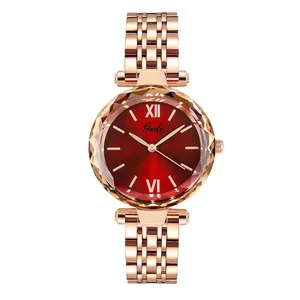 Montre femme en acier inoxydable or rose avec cadran rouge et verre à facettes diamant