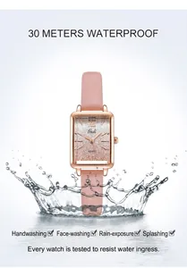 Detail of rose gold rectangular watch with gradient dial showing 30m water resistance