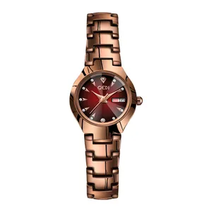 Montre femme or rose avec cadran rouge foncé et affichage complet du calendrier