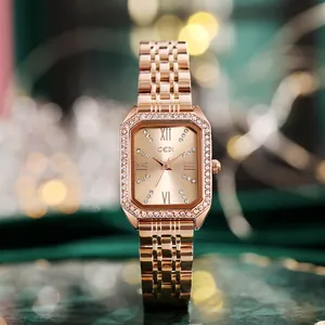 Elegant rose gold ladies watch with octagonal green dial and sparkling rhinestones