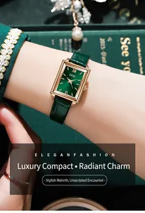Elegante goldene quadratische Uhr mit grünem Zifferblatt und Lederarmband am Handgelenk