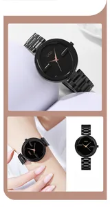 Détail de la montre à quartz GEDI avec bracelet en métal noir et aiguilles en or rose