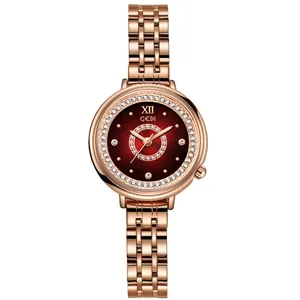 Montre élégante en or rose avec cadran dégradé rouge et cristaux pour femmes