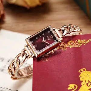 Women's rose gold square quartz watch with burgundy dial and crystal indices