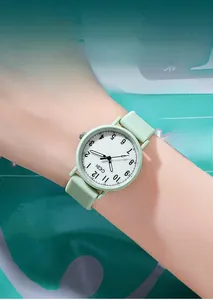 Mint green silicone quartz watch with white dial and Arabic numerals for students