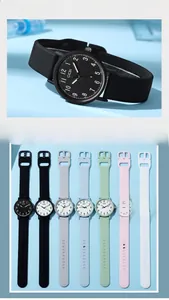 Close-up of minimalist quartz watch featuring a waterproof silicone strap in six candy colors