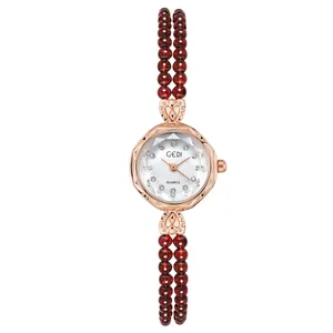 GEDI Luxus-Quarzuhr für Damen mit Roségoldgehäuse und rotem Perlenarmband