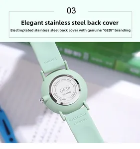 Detail view of GEDI quartz watch stainless steel back cover with mint green silicone strap