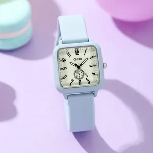 Minimalist square quartz watch with light blue silicone strap and macaron style aesthetic