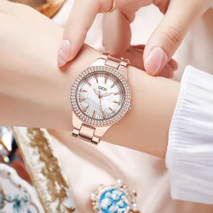 Montre GEDI luxe en or rose pour femme avec lunette en strass et bracelet en métal