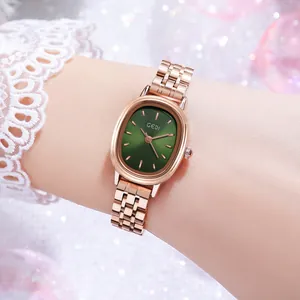 Montre élégante pour femme avec cadran ovale vert et bracelet en acier rose doré