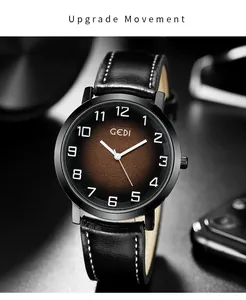 Detailed macro view of black textured watch dial with white numerals and leather strap