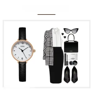 Chic rose gold watch with black leather strap paired with professional fashion accessories