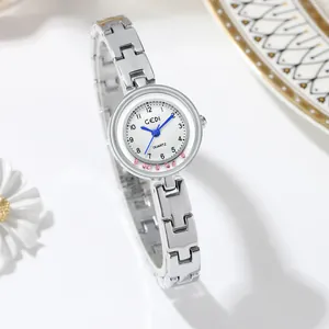 Elegant silver bracelet watch with a small white dial and sparkling pink crystals