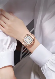Elegant rose gold square watch for women shown on wrist with a white shirt
