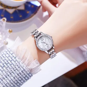 Women's quartz watch with pearl dial and crystal bezel on a silver steel band