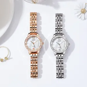 Elegant ladies quartz watch set with mother of pearl dial and crystal encrusted bezel