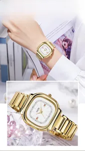 Detail of GEDI gold square watch showing the metal strap and minimalist white dial face
