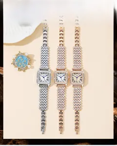Detailed view of square quartz watches with crystal accents and three elegant color finishes