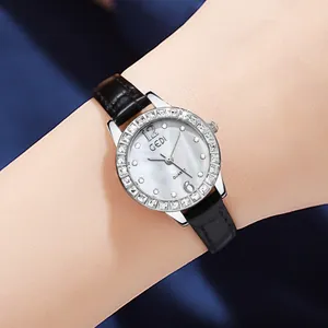 Elegant women quartz watch with shimmering mother of pearl dial and crystal bezel