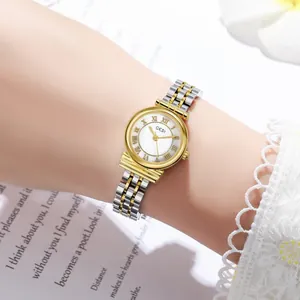 Close-up of retro ladies' quartz watch featuring Roman numerals and a two-tone steel band