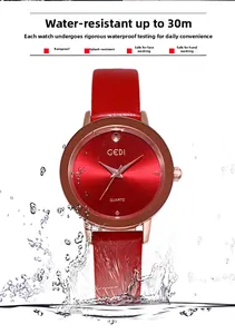 Close-up of red quartz watch with rose gold case and 30m water resistance display