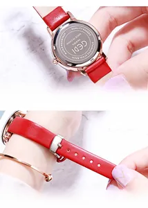 Detail of GEDI quartz watch stainless steel back and stylish red leather strap