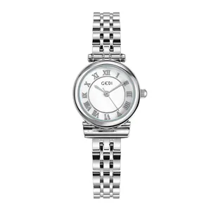 Macro view of GEDI silver quartz watch with Roman numerals and steel mesh bracelet