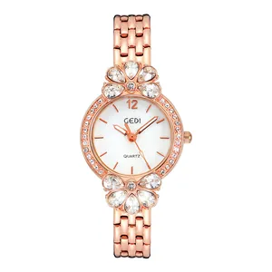 Orologio al quarzo lusso da donna a forma di fiore oro rosa con cristalli e acciaio