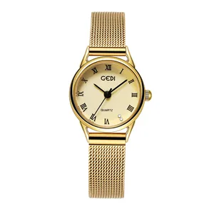 Vintage goudkleurig dameshorloge met mesh bandje, Romeinse cijfers en strassteentjes