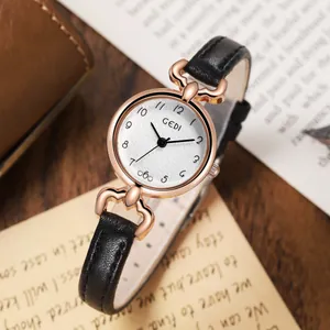 GEDI minimalist women's watch with rose gold case, white dial and black leather strap