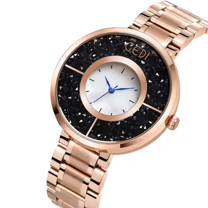 Montre femme en acier rose doré avec bague en cristal noir et cadran en nacre véritable