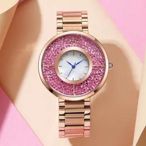 Montre luxe en acier inoxydable or rose avec cristaux roses et cadran en nacre