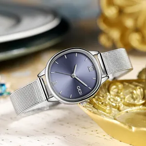 Elegant women's oval watch with purple sunray dial and silver mesh strap