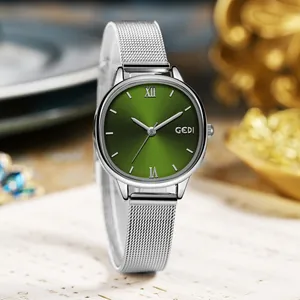 Elegant women's quartz watch with green sunray dial and silver mesh steel strap