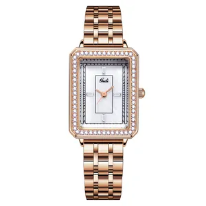 Elegante orologio quadrato da donna in oro rosa con lunetta diamantata e quadrante in madreperla