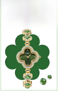 Detailed view of GEDI watch with clover-shaped dial and green malachite style accents