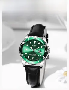Close-up of green sunray dial and rotating bezel on black leather strap business watch