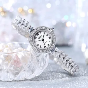 Luxurious women's quartz watch with vintage Roman numerals and zircon leaf strap