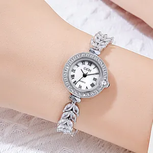 Elegant silver quartz watch for women with leaf-shaped crystal band and Roman numerals