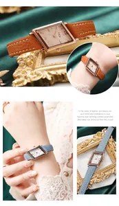 Retro rectangular quartz watch with rose gold case and leather strap on velvet background