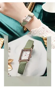 Detail of GEDI square watch with green leather strap and rose gold textured dial